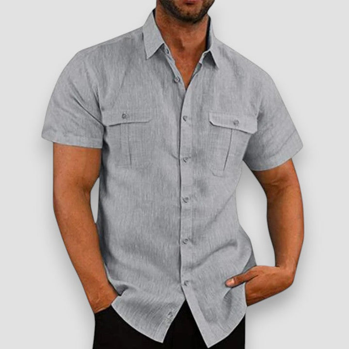 "Kasper™ | Kortärmad Skjorta" can be rewritten as "Kasper™ | T-shirt med kort ärm".